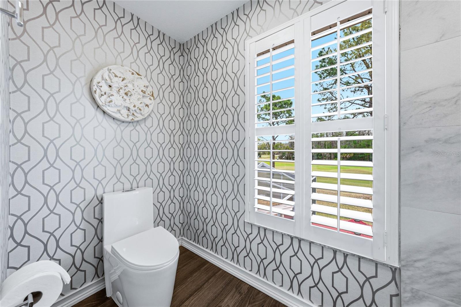 Remodeled Primary Bath with Toilet and Shower Room