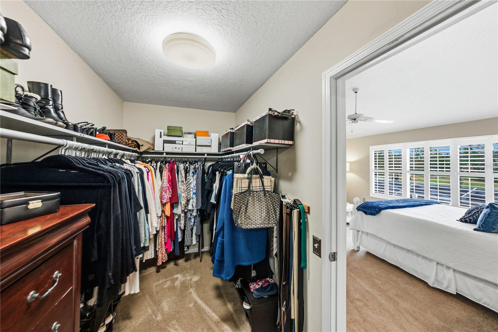 Half of 20X6 Walk in Primary Suite Closet