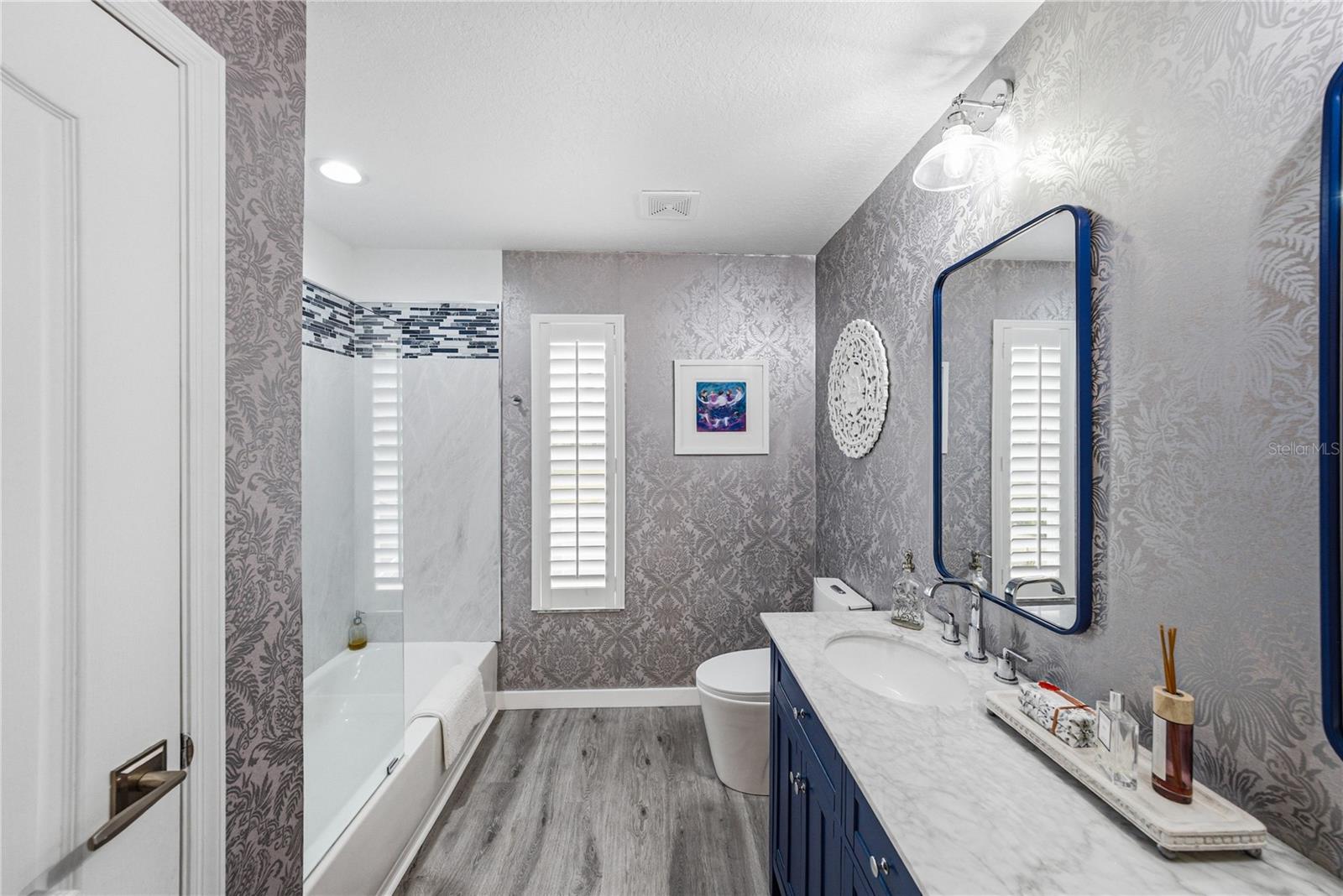 Remodeled Second Up Stairs Bath with Dual Sinks and Linen Closet