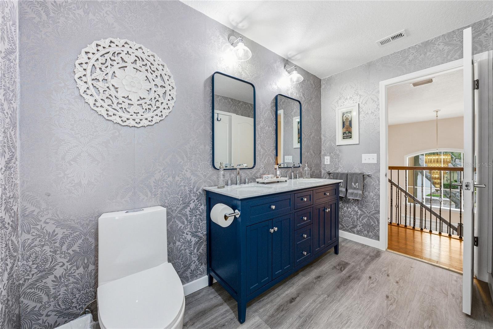 Remodeled Second Up Stairs Bath with Dual Sinks and Linen Closet