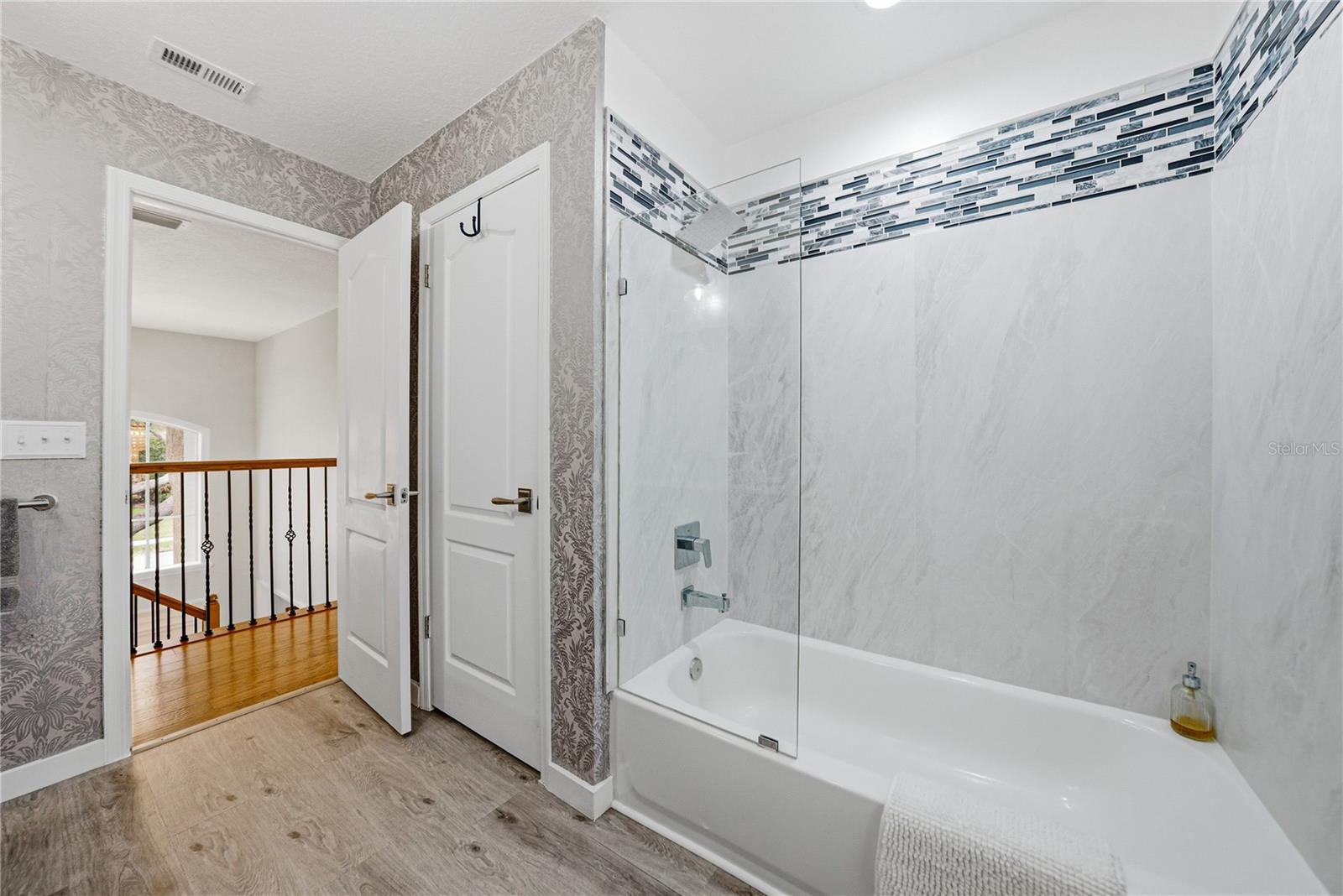Remodeled Second Up Stairs Bath with Dual Sinks and Linen Closet