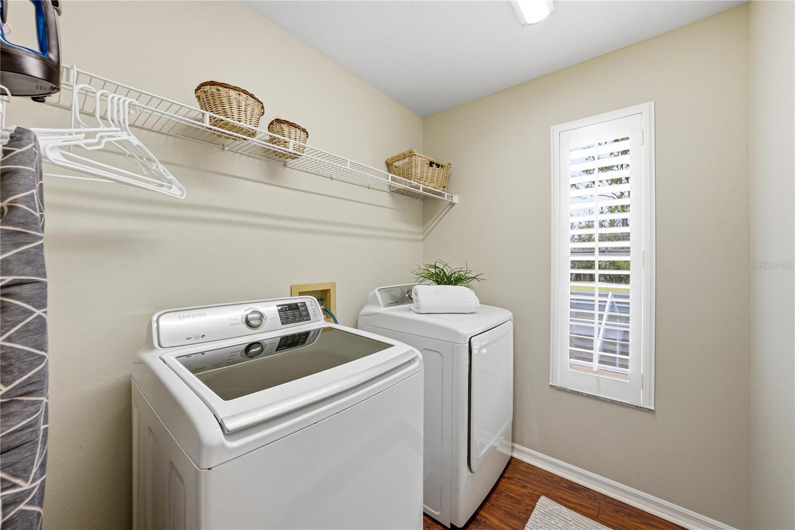 Upstairs Dedicated Laundry Room with Plantation Shutters