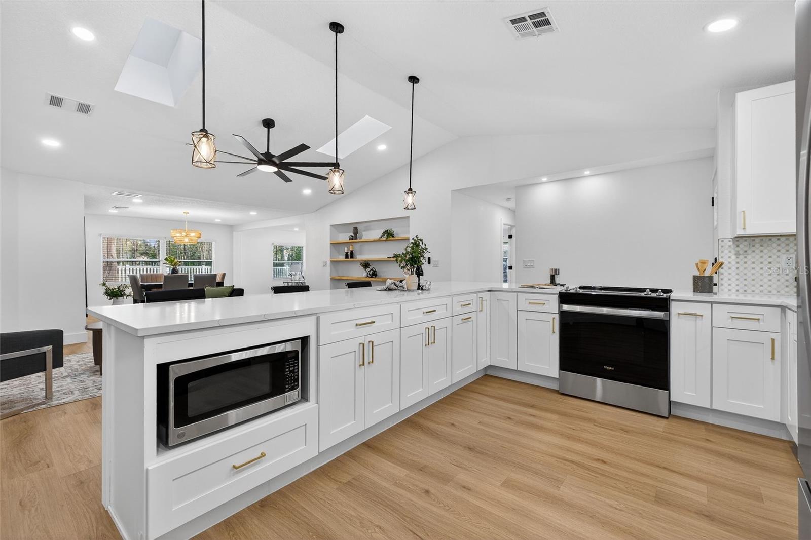 STAINLESS STEEL appliances with built-in microwave cabinetry