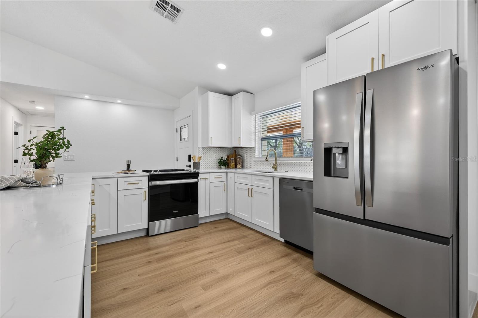 Modern, functional layout with tons of prep and serving space