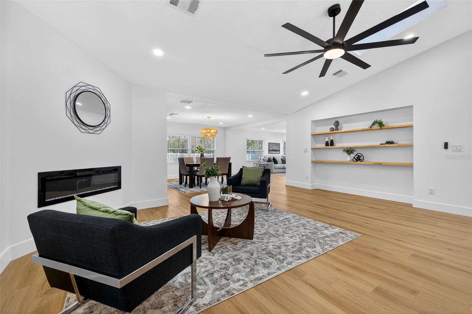 Designer living room with built-in ELECTRIC FIREPLACE feature