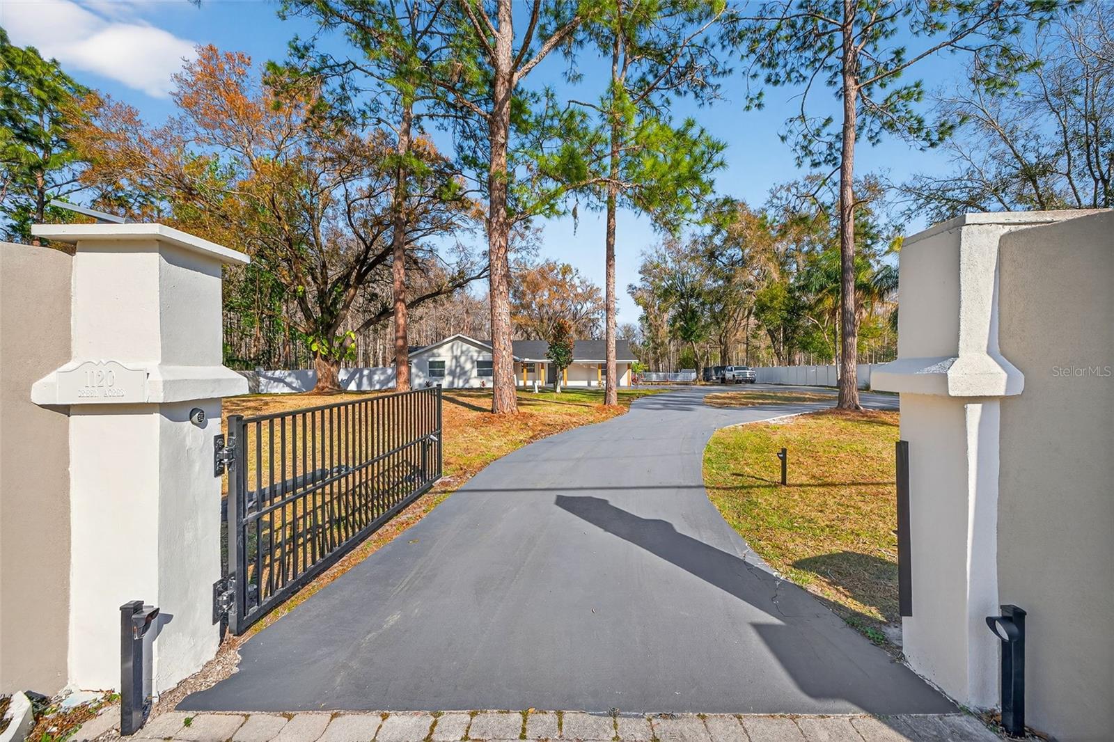 Beautiful front approach with a true estate-style entrance