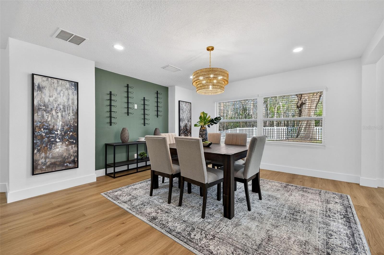 Modern finishes and accent walls create a custom feel