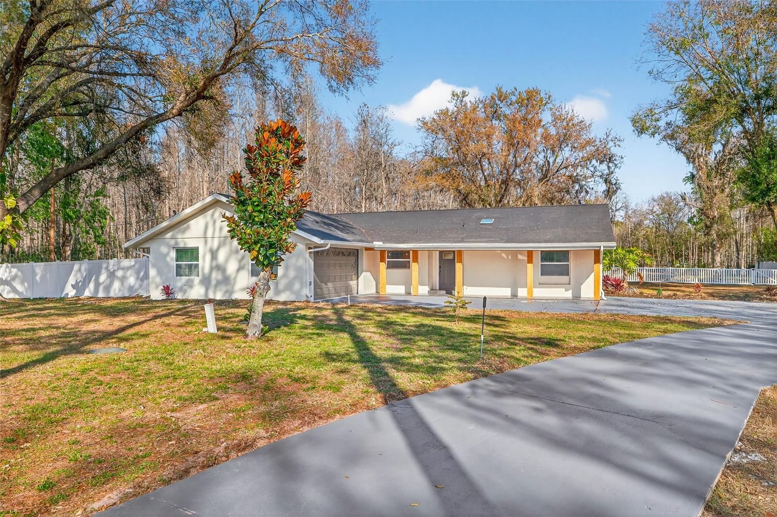 2-CAR GARAGE plus EXTENDED DRIVEWAY for extra parking