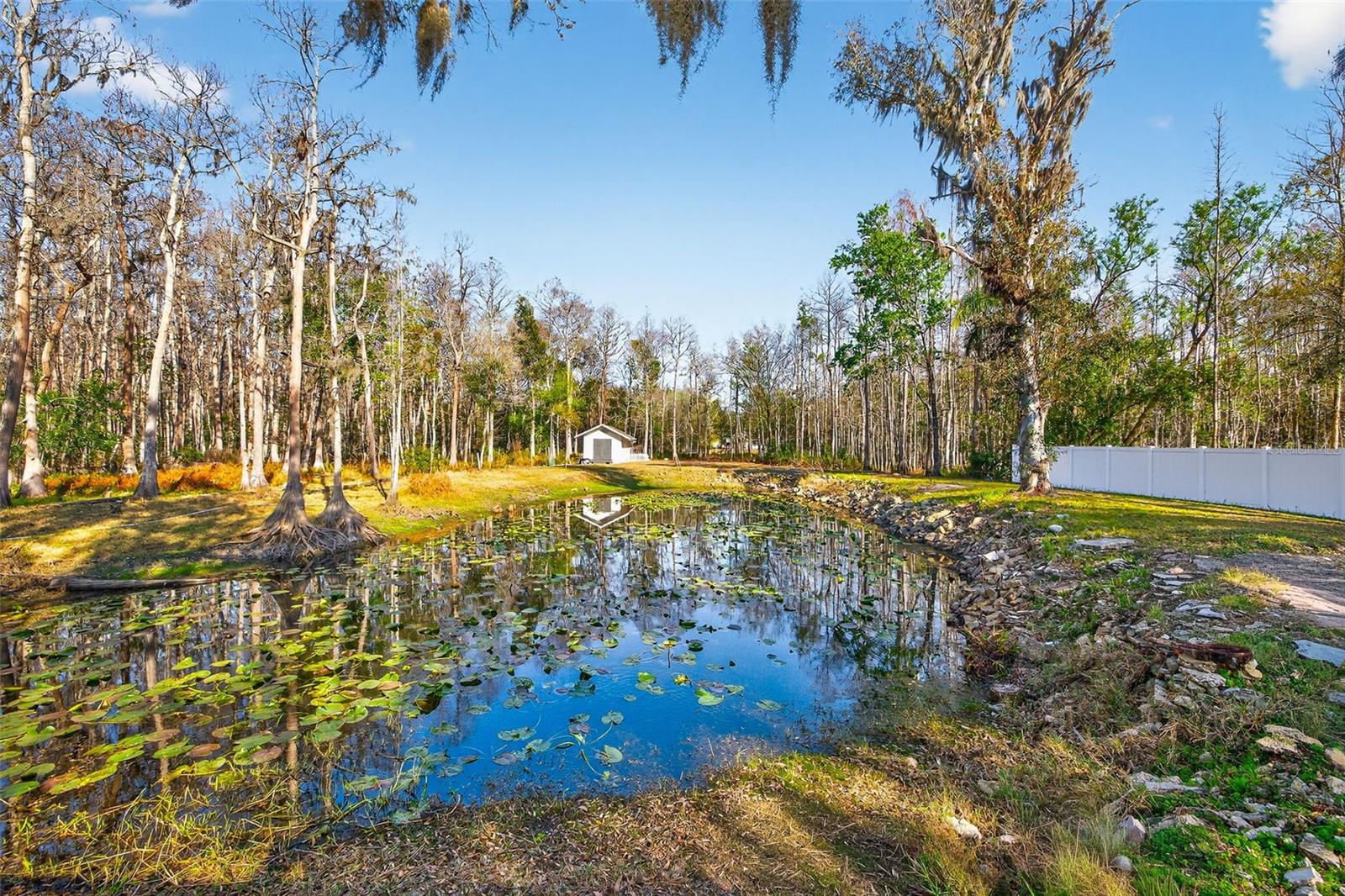 Your own PRIVATE POND—serene views right in your backyard