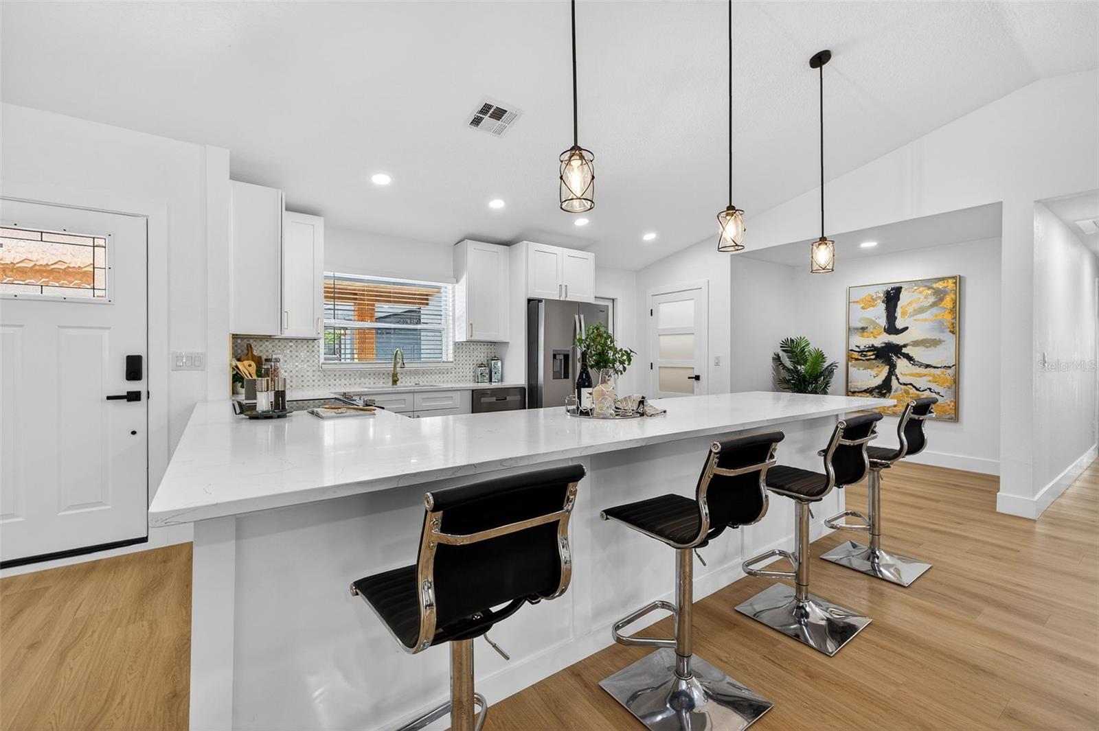 Fully remodeled chef’s kitchen with QUARTZ countertops