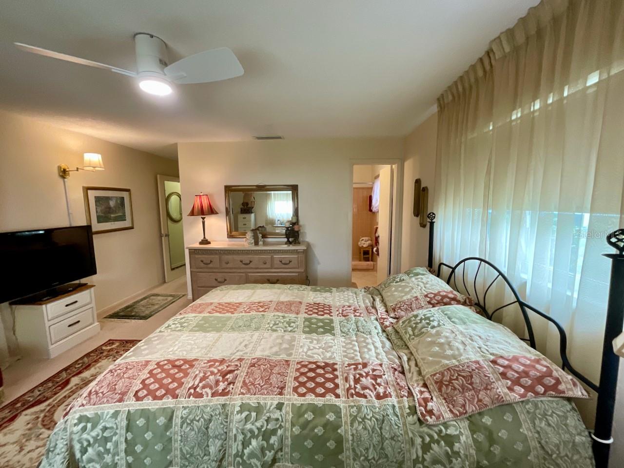 23-Primary bedroom door to primary bath and hallway