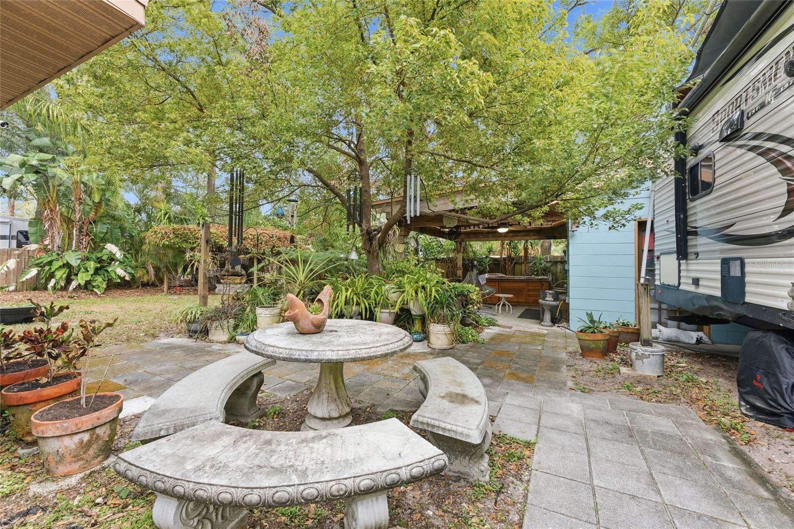 from right side of back yard looking towards back corner of yard