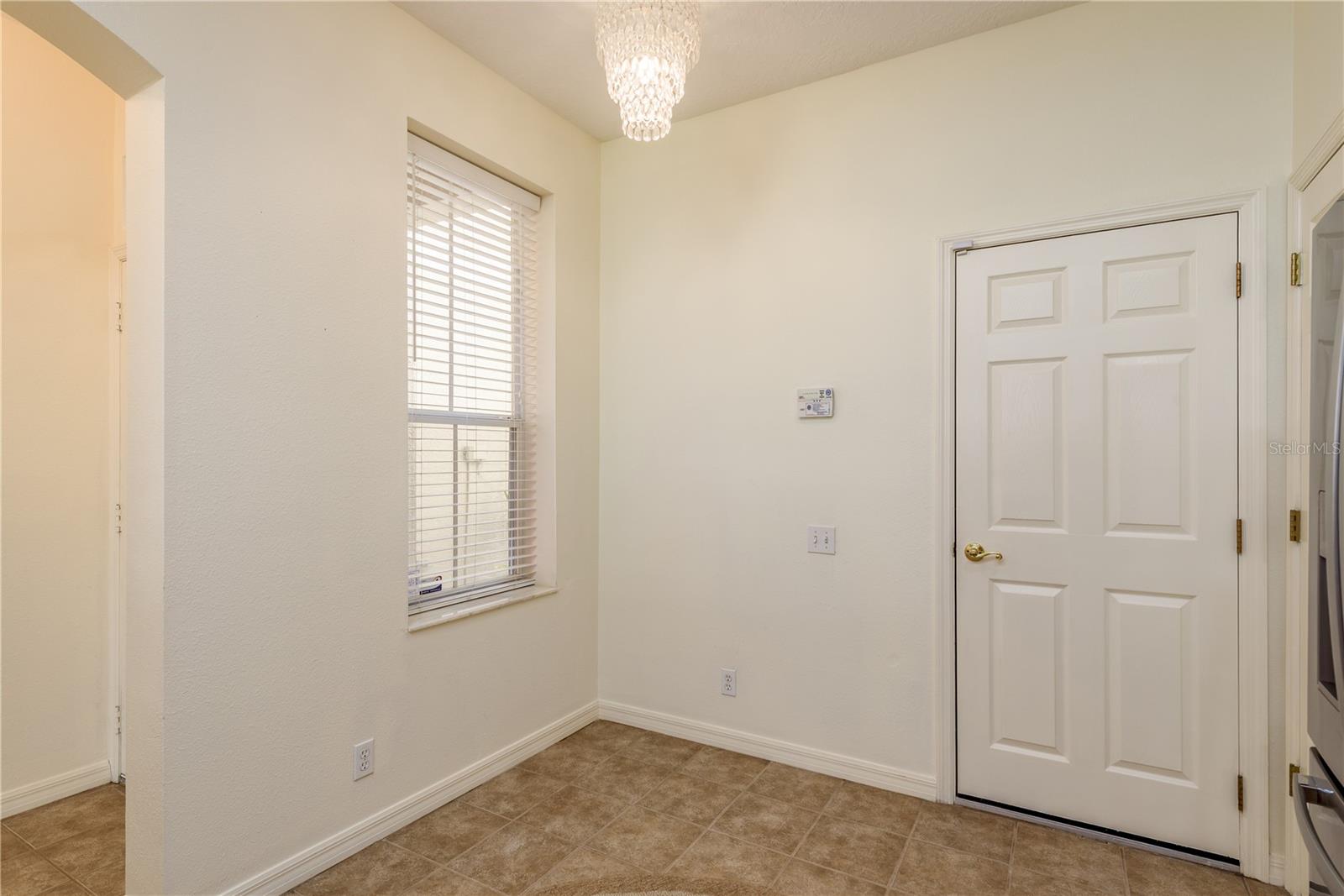 Kitchen / Breakfast Nook - Facing Door to Garage