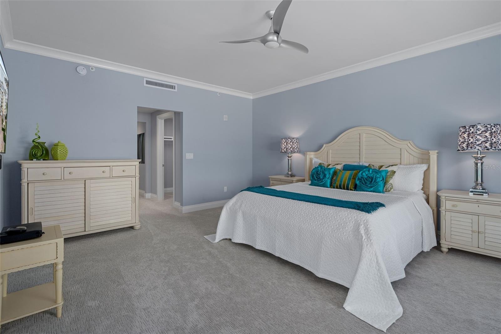 The primary suite includes dual walk-in closets.