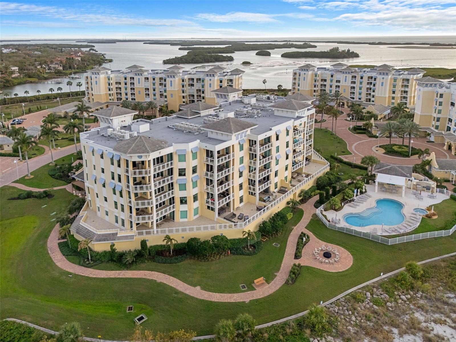 Sunset Pointe is a gated waterfront community offering a resort lifestyle with private beaches, a fitness center, and a Gulf-view pool. Residents enjoy lush landscaping and walking paths, all just 45 minutes from Tampa International Airport.