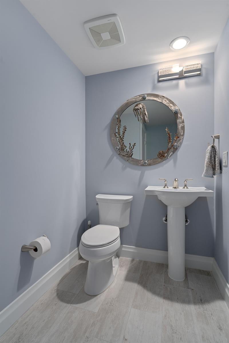 The powder bath is conveniently located off the large foyer.