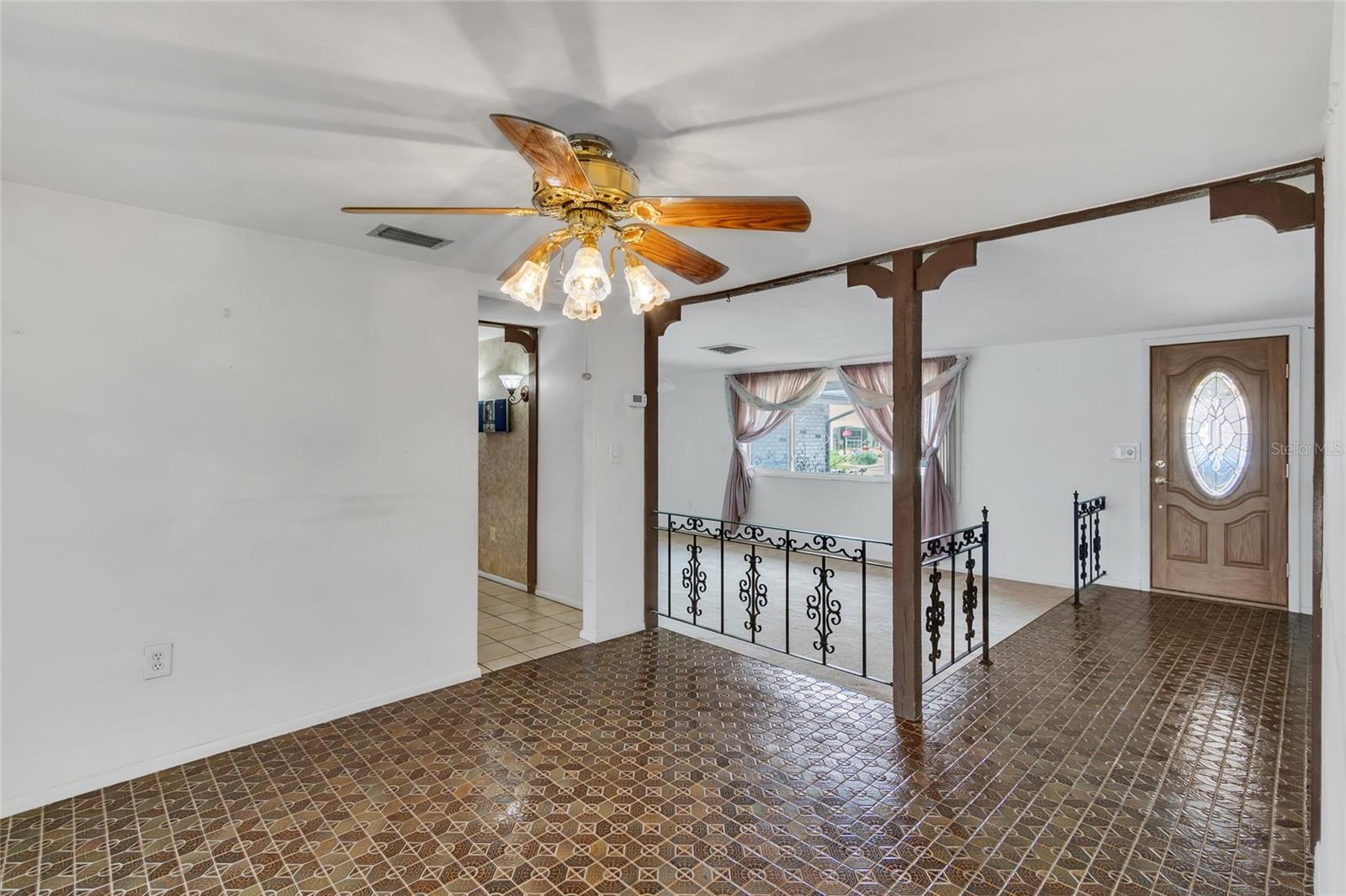 view of living room and entry from dining room