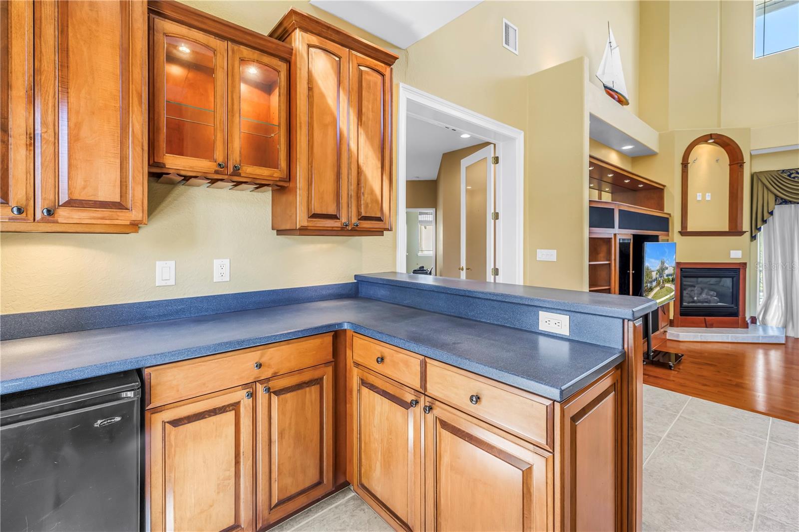 Bar for entertaining with sink & beverage refrigerator