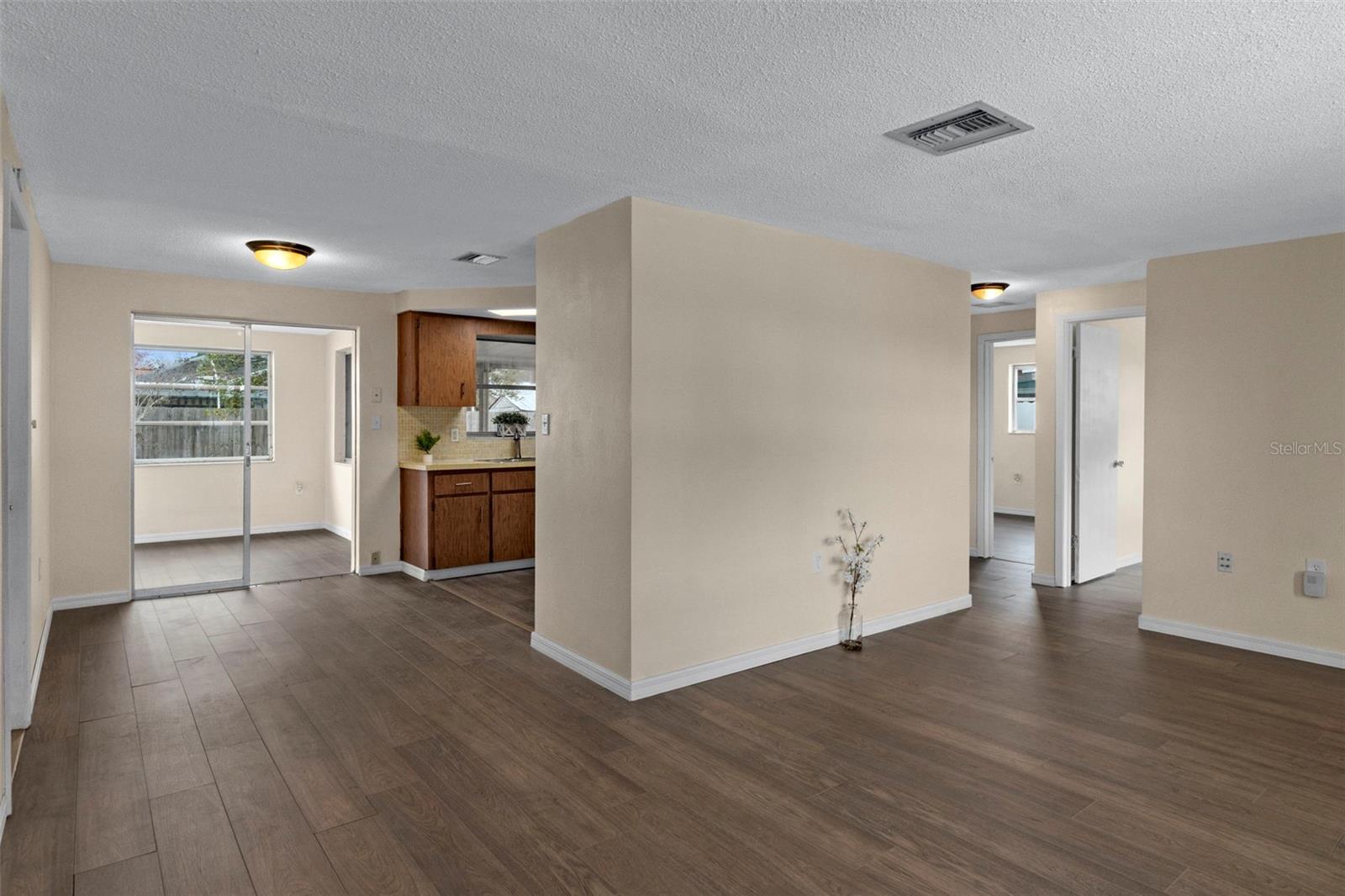 This view shows how the living room and dining room flow seamlessly together