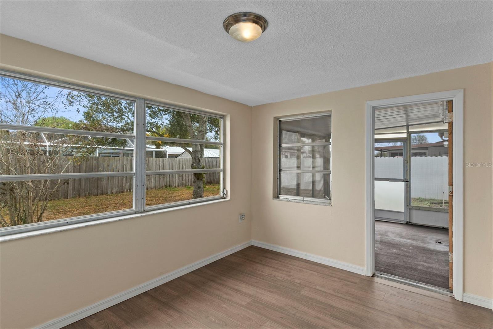 Bonus Room with a door to the screened in porch