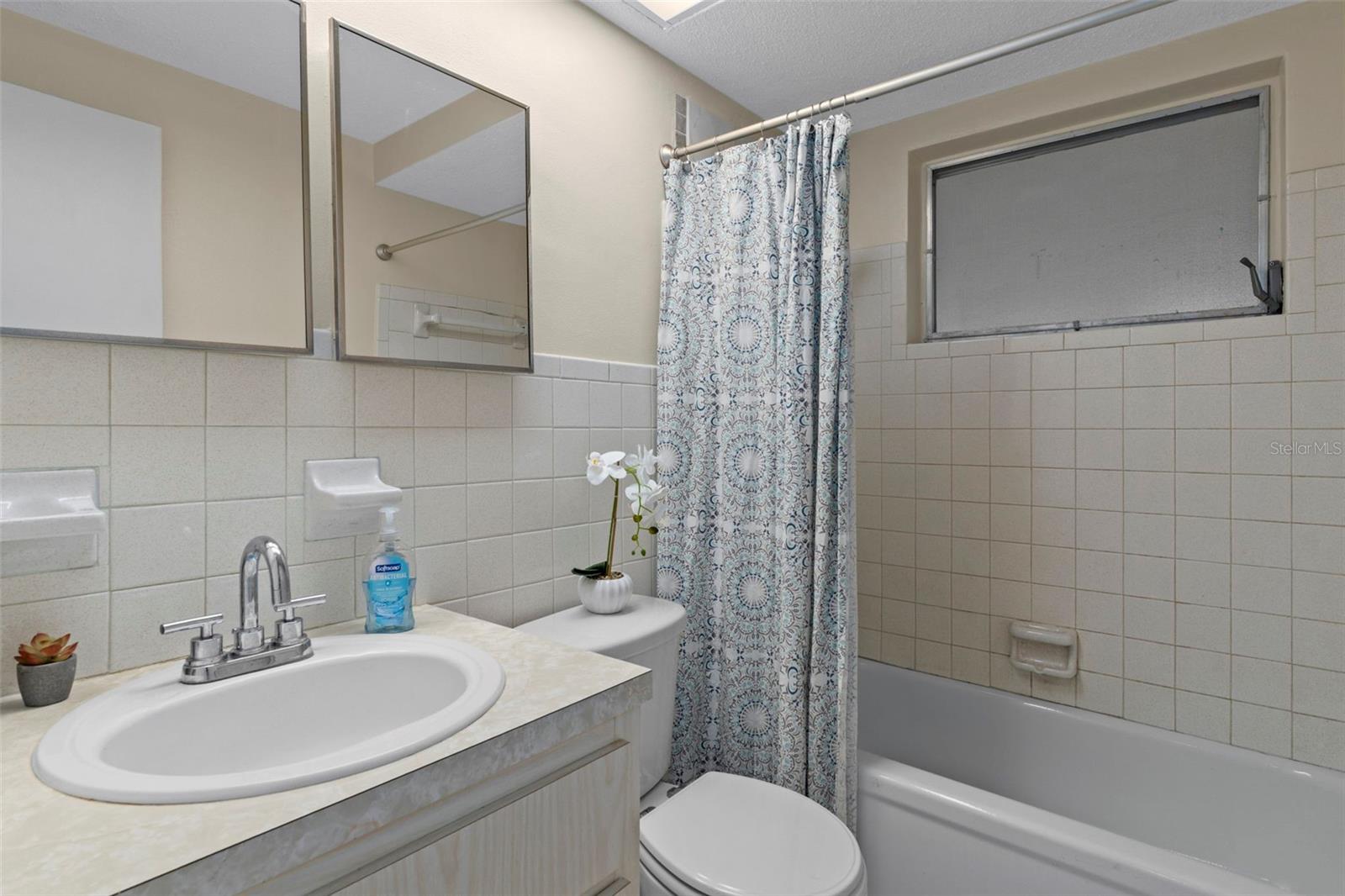 Guest Bathroom with a tub/Shower Combo