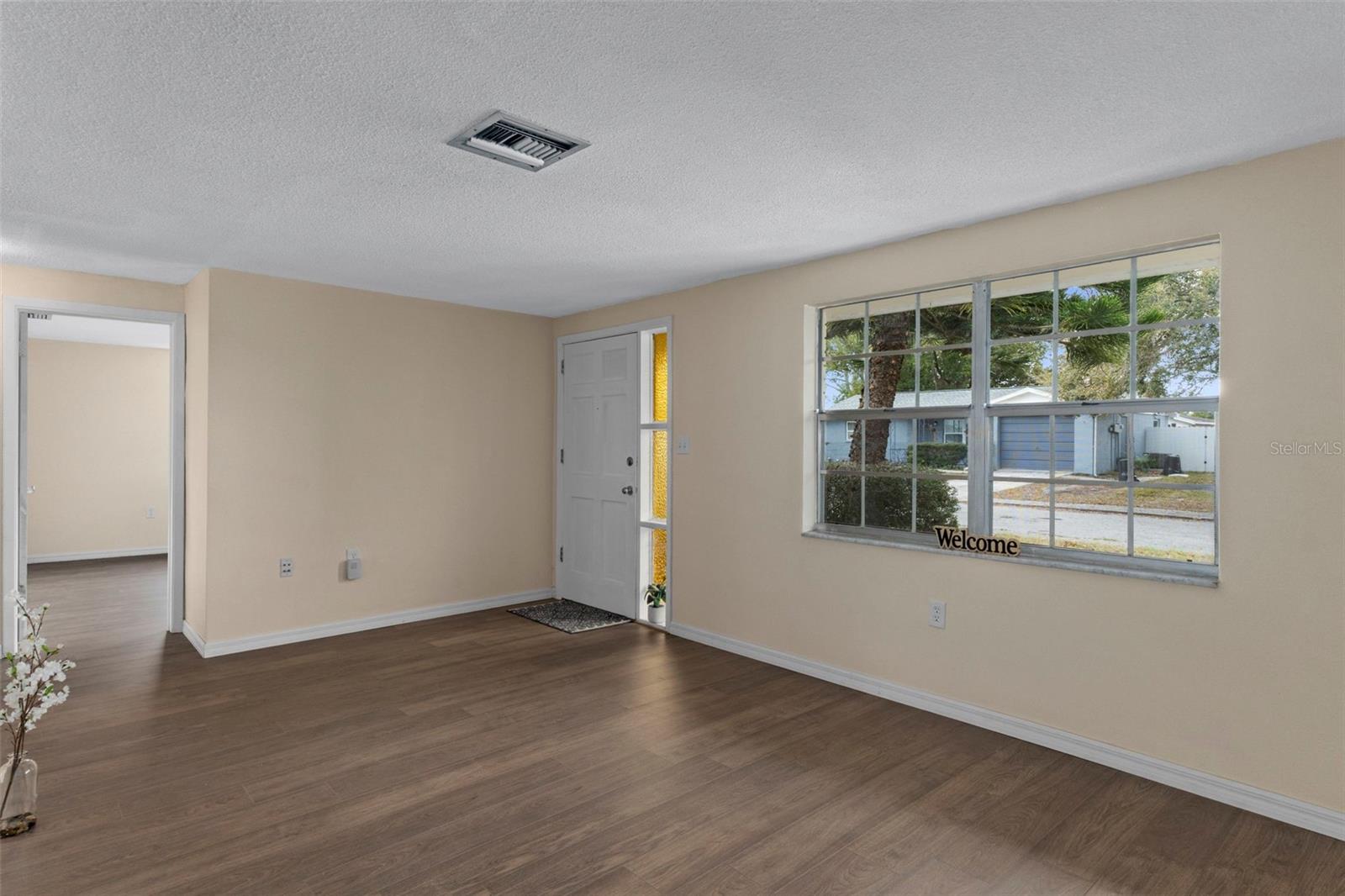 The Living Room is spacious, light and bright. Perfect for relaxing with your family