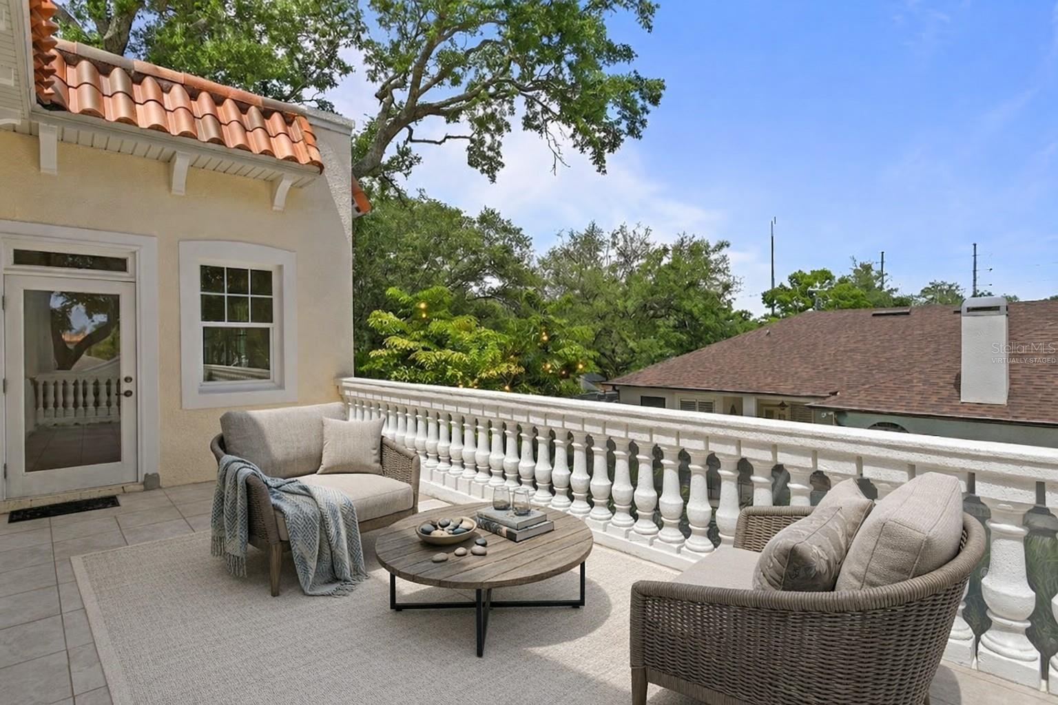 Virtually staged private terrace off the 5th bedroom / in-law suite