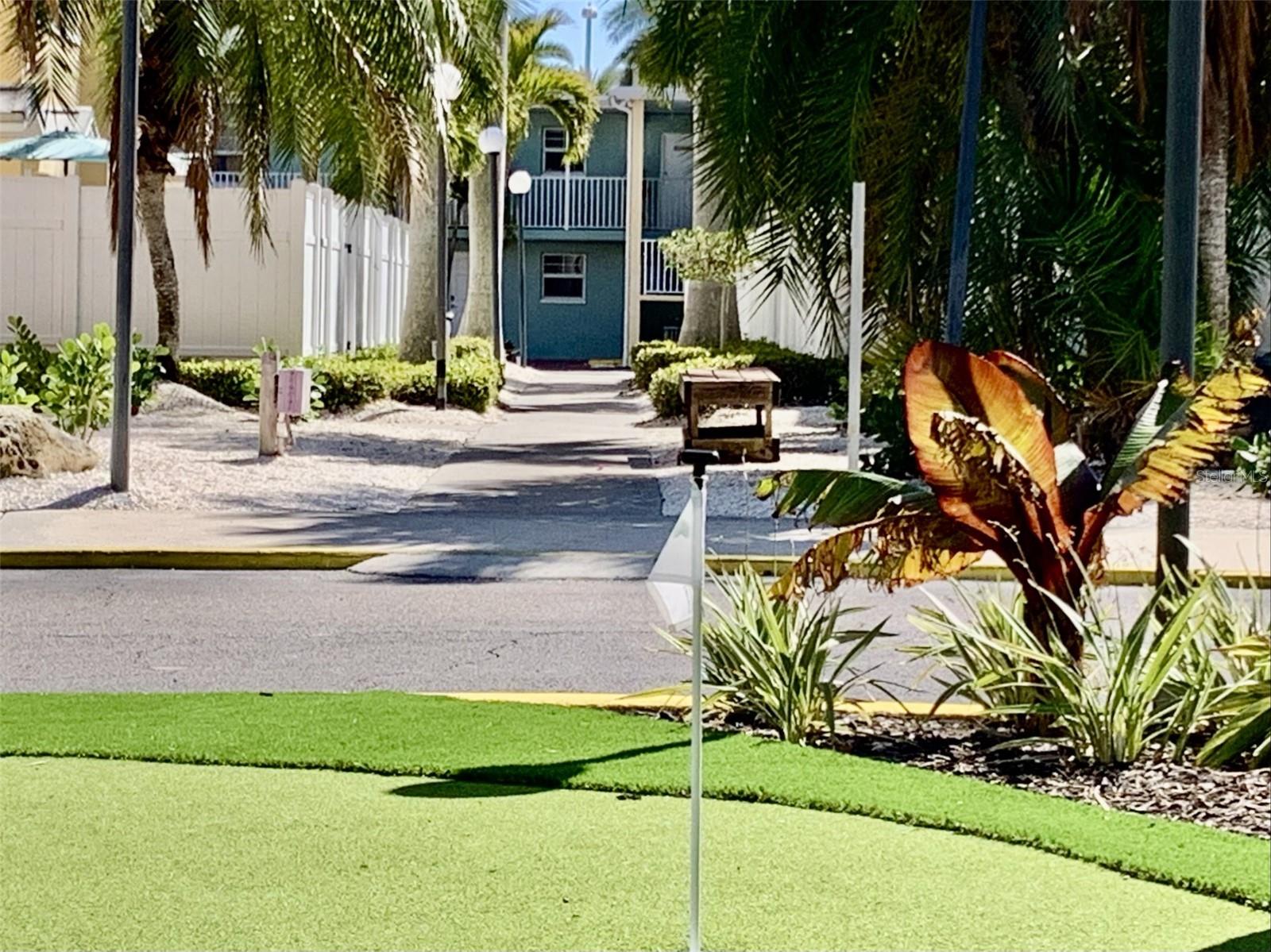 Putt Putt golf is directly across and down this corridor