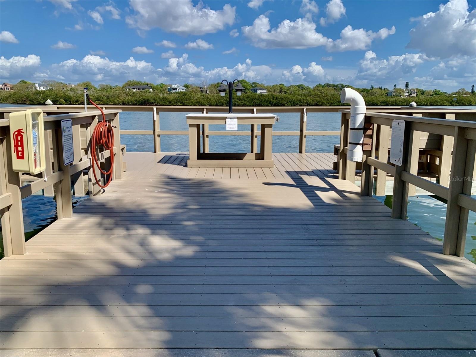 Fishing dock and boat slips are on the intercoastal waterway east side of complex