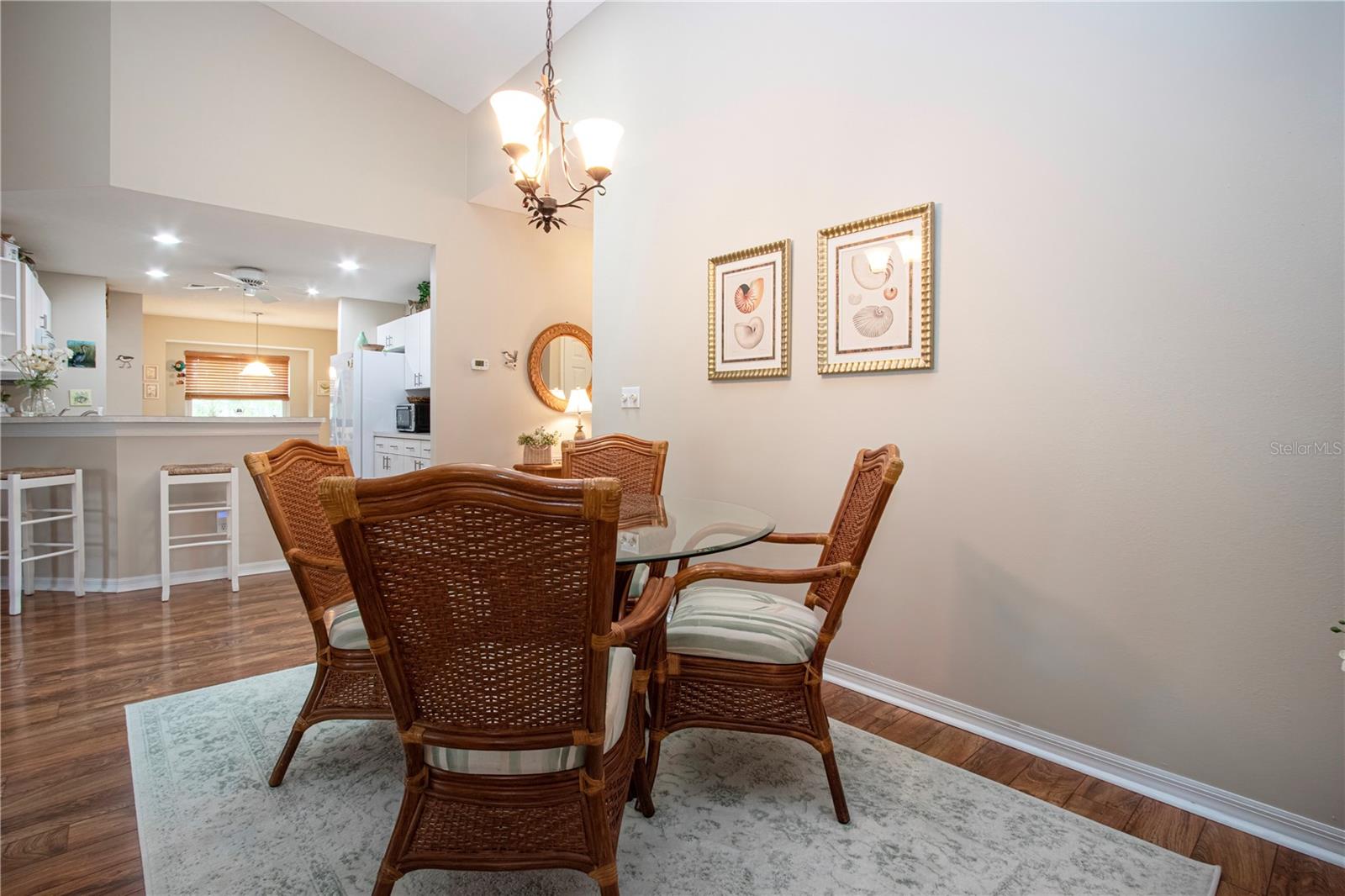 Dining room with open view of kitchen