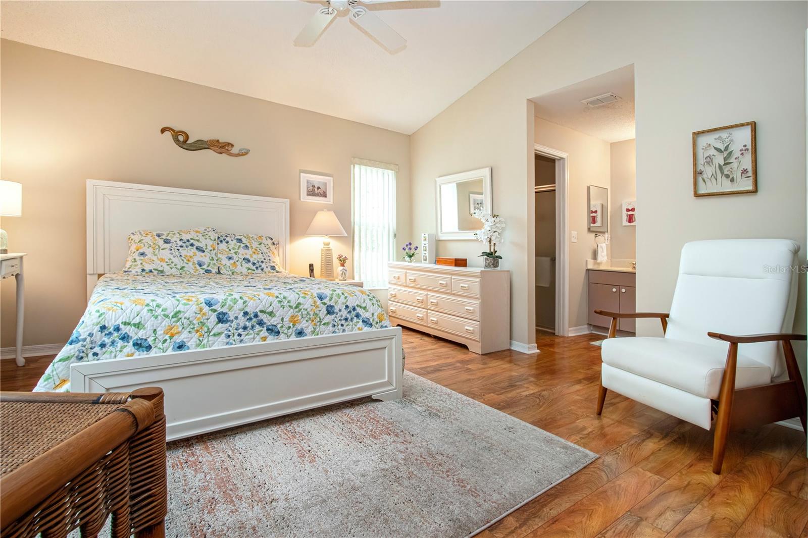 Master bedroom with closet and bathroom entryway