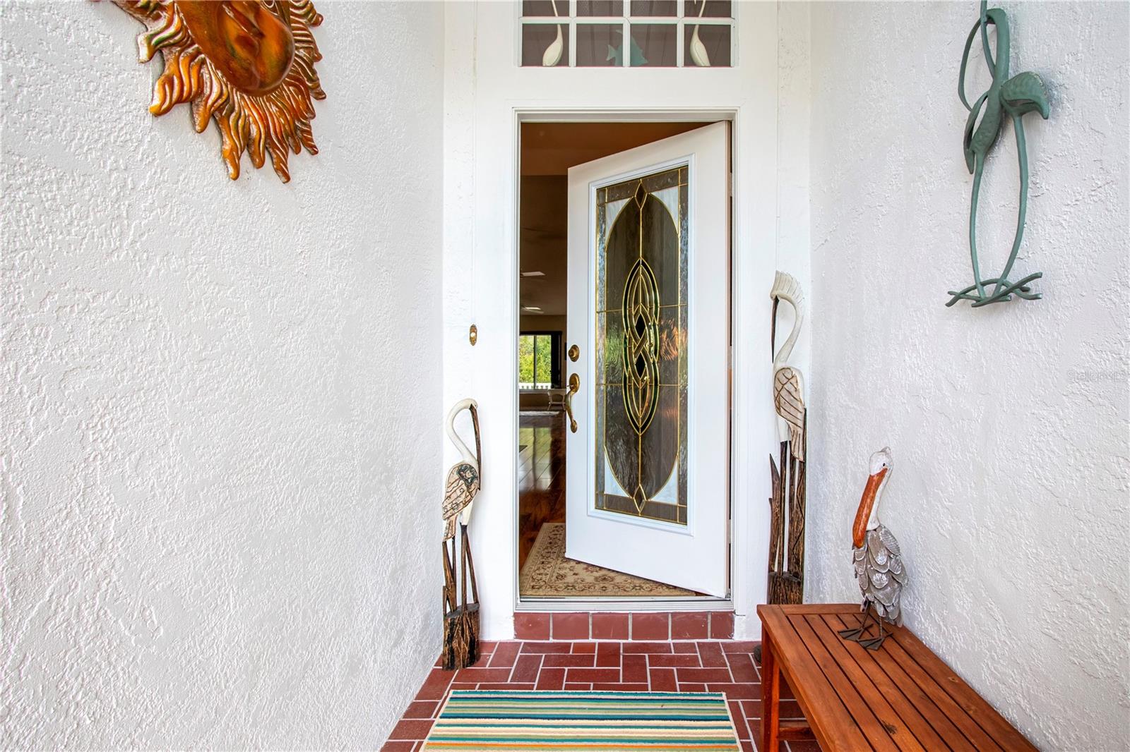 front porch with decorative  entry door