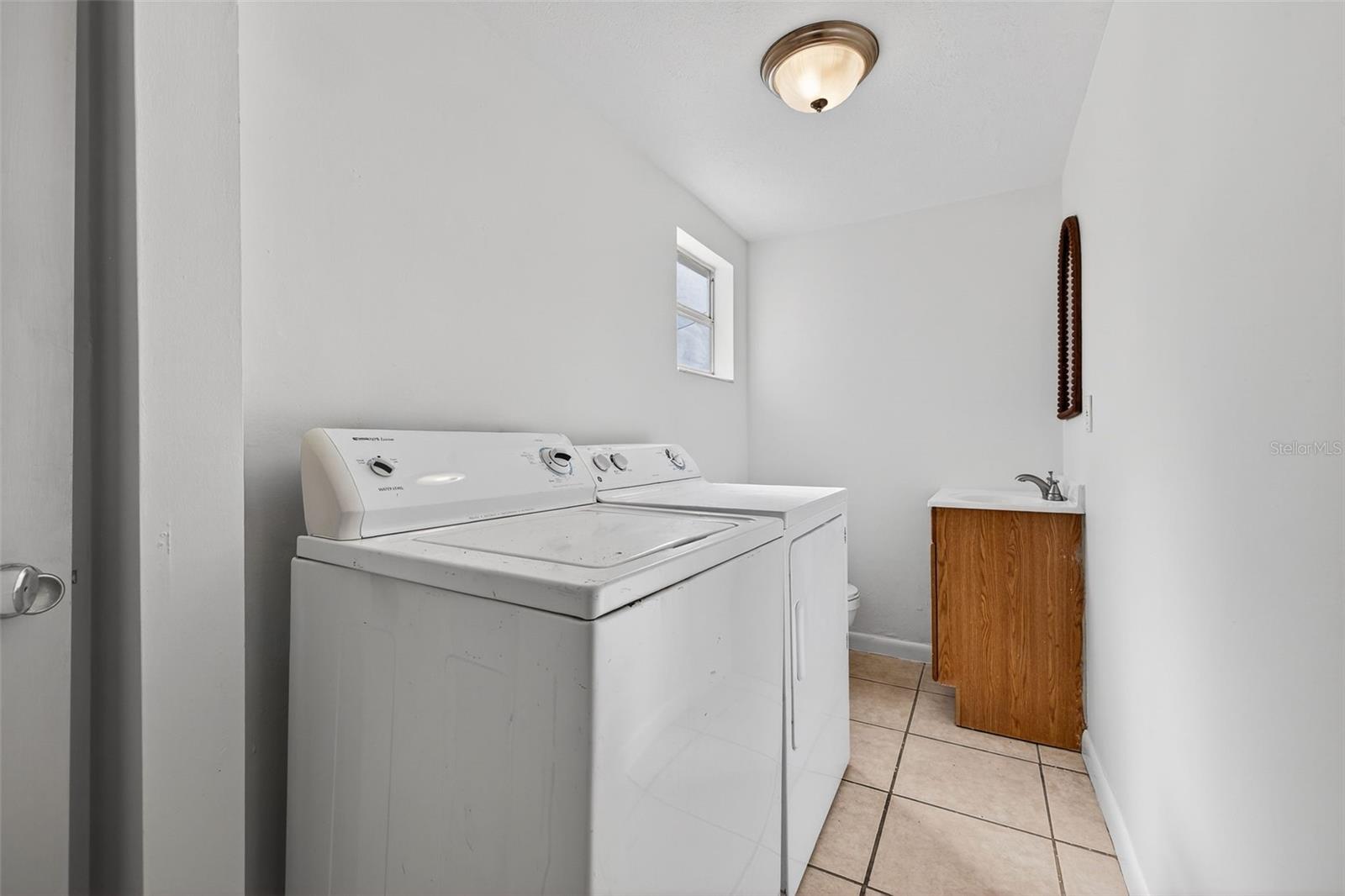 Main level laundry with half bath.