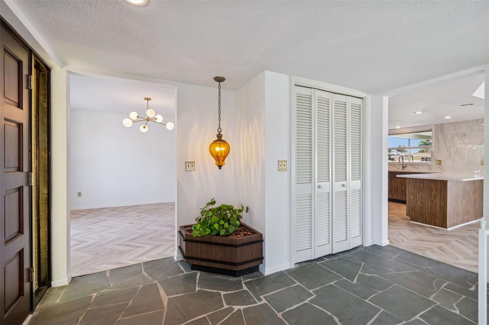 This home still has vibes of the 1960's...retro decor mixed with Mid Century Modern would make this home a standout!