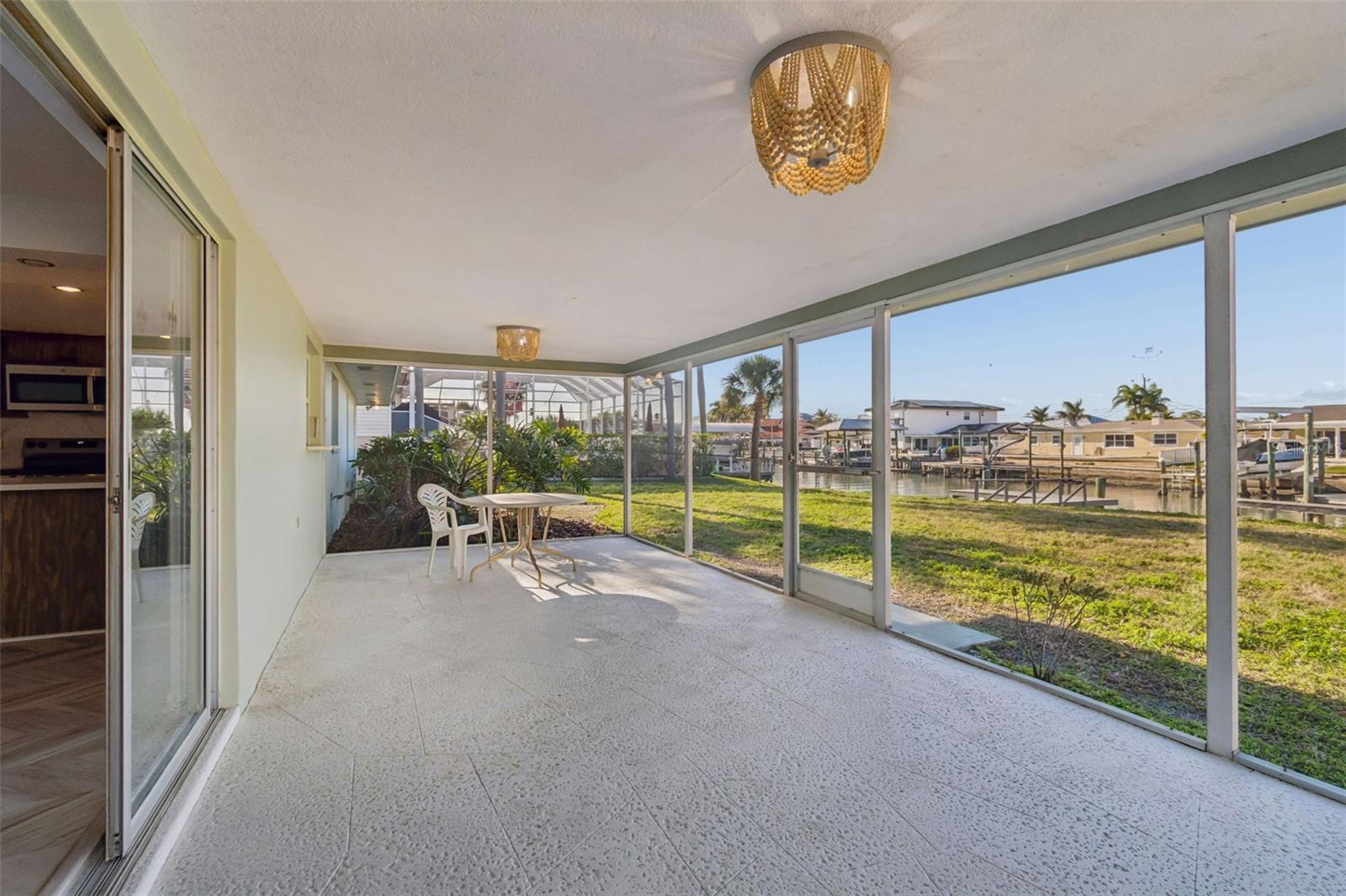 Large screened porch for relaxing with a water view!