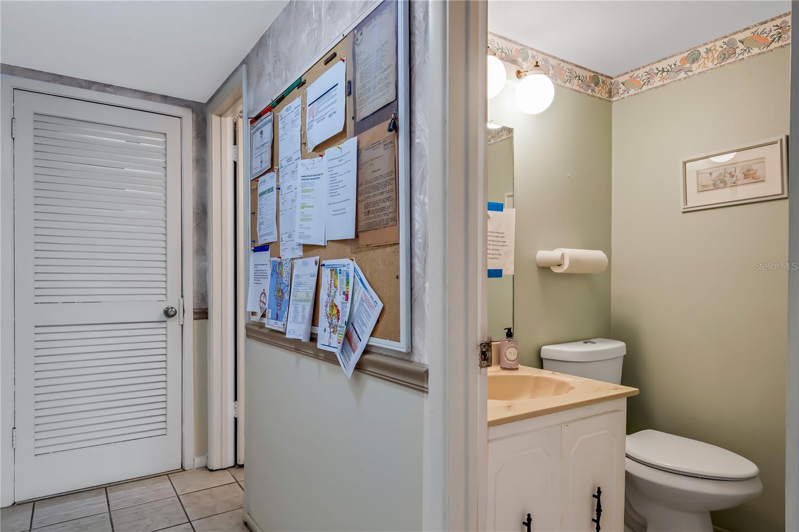Restrooms between clubhouse & laundry room