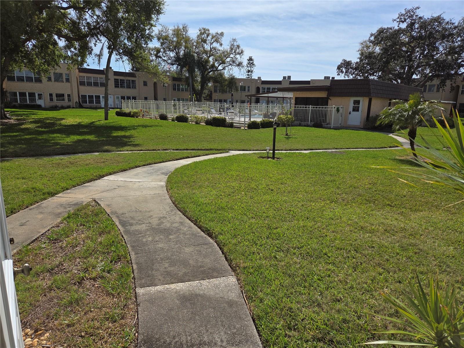 Walkway From Florida Room to Pool and Clubhouse
