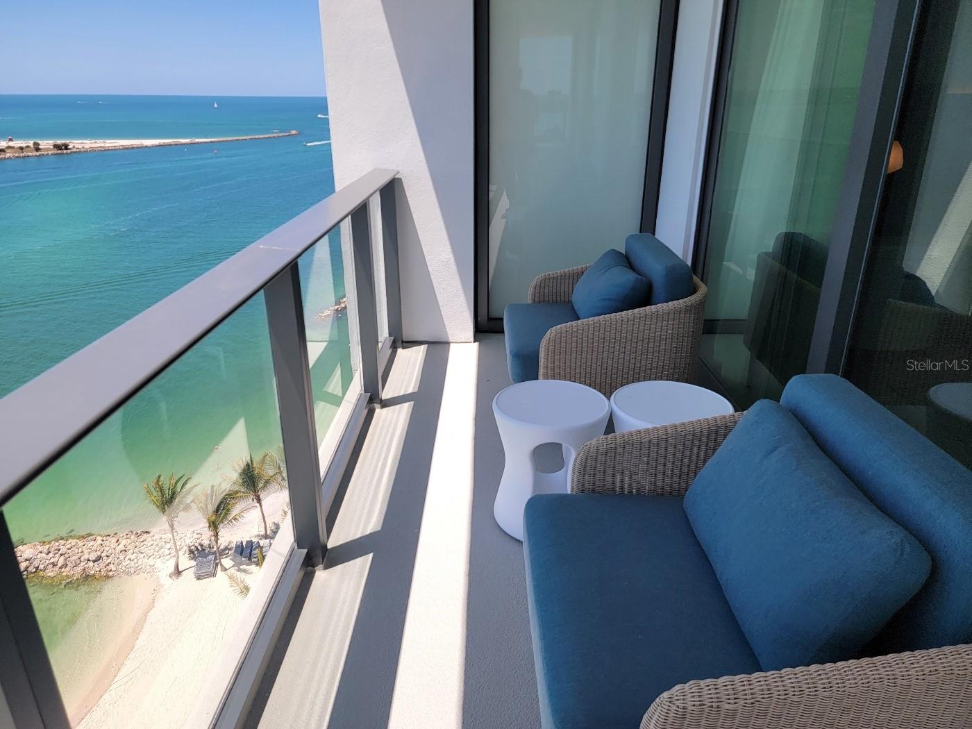 Solid privacy wall between only two beach facing balconies  per floor in the upper tower