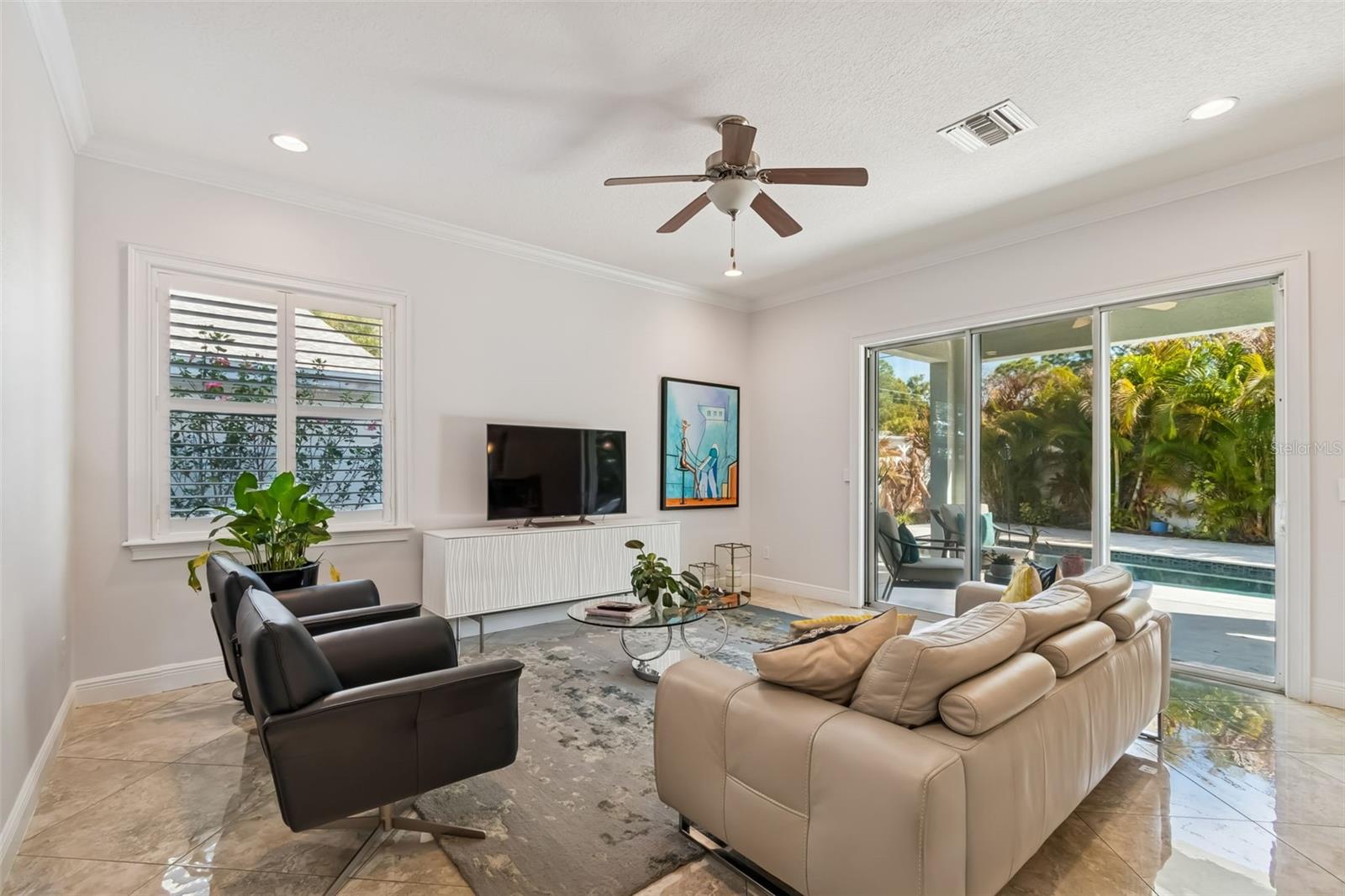 Spacious living room with open layout and abundant natural light.