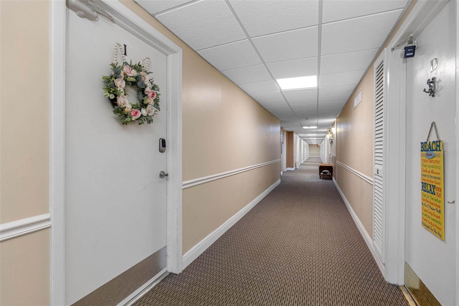 Hallway & Entrance To Condo