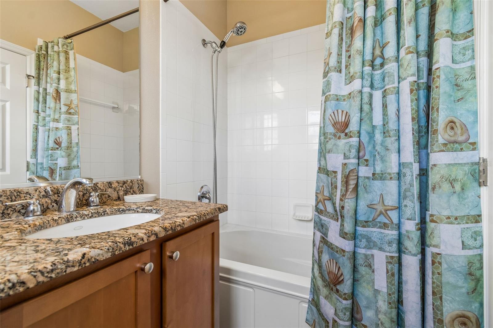 2nd bathroom includes deep soaker tub and shower.