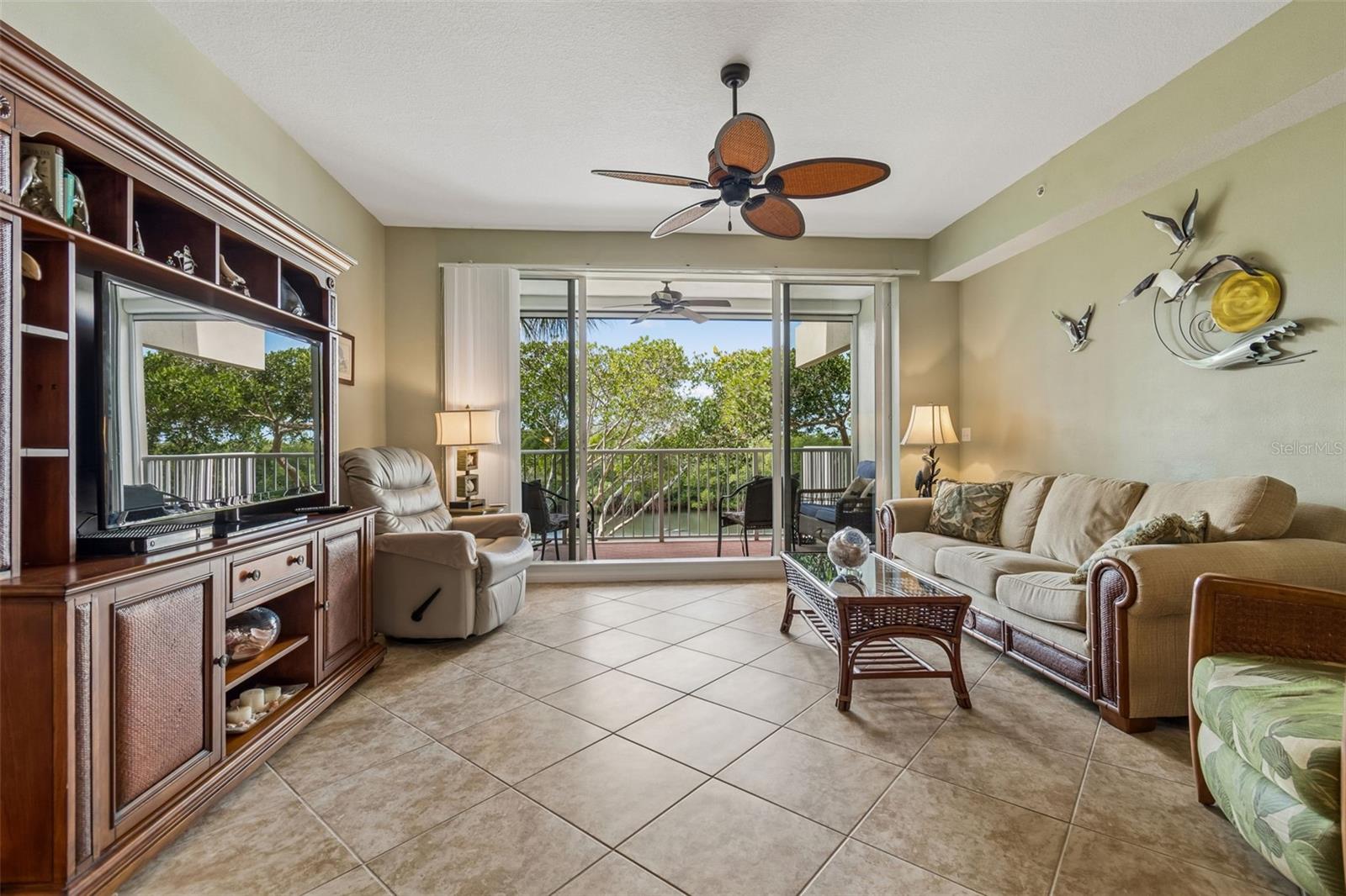 Living area with views of the canal and nature