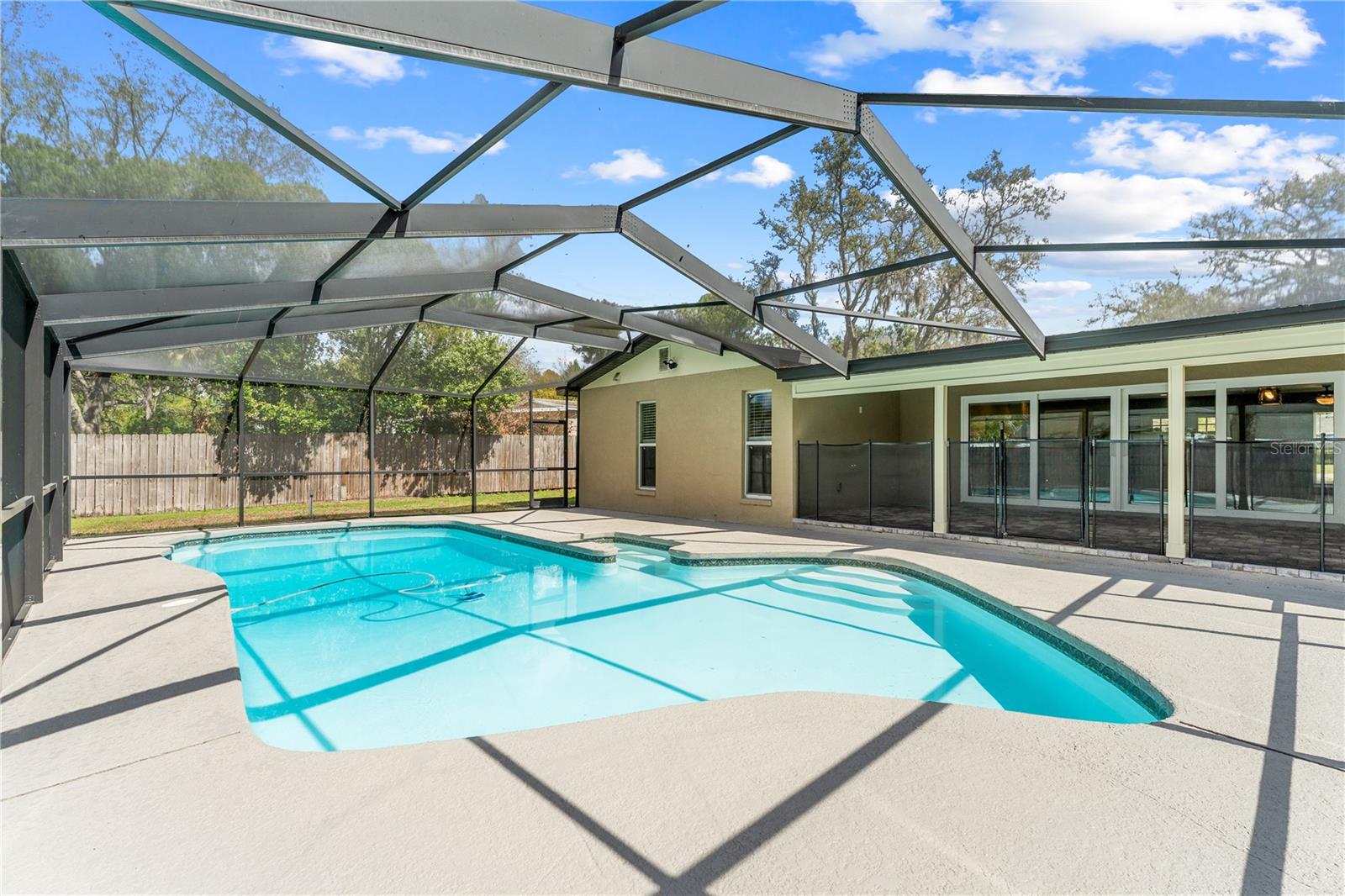 Screened in pool with Nebula light rails