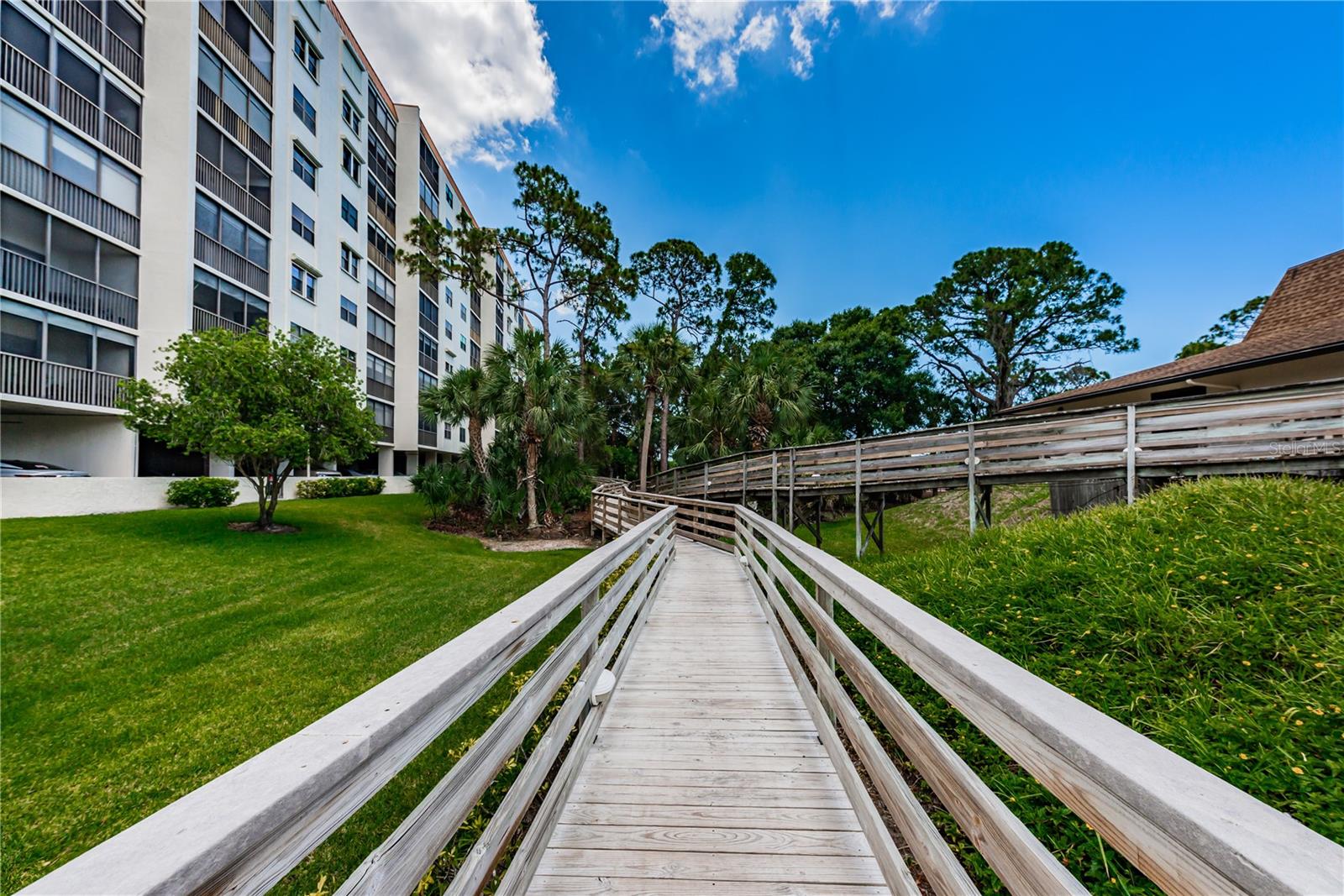 walkway to pool and clubhouse