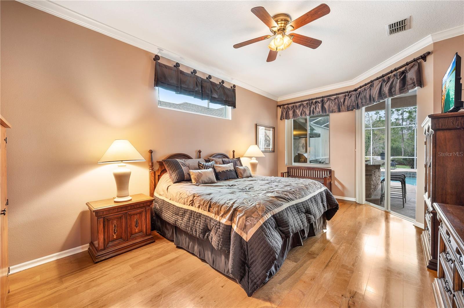 Primary Suite with Sliders to Pool