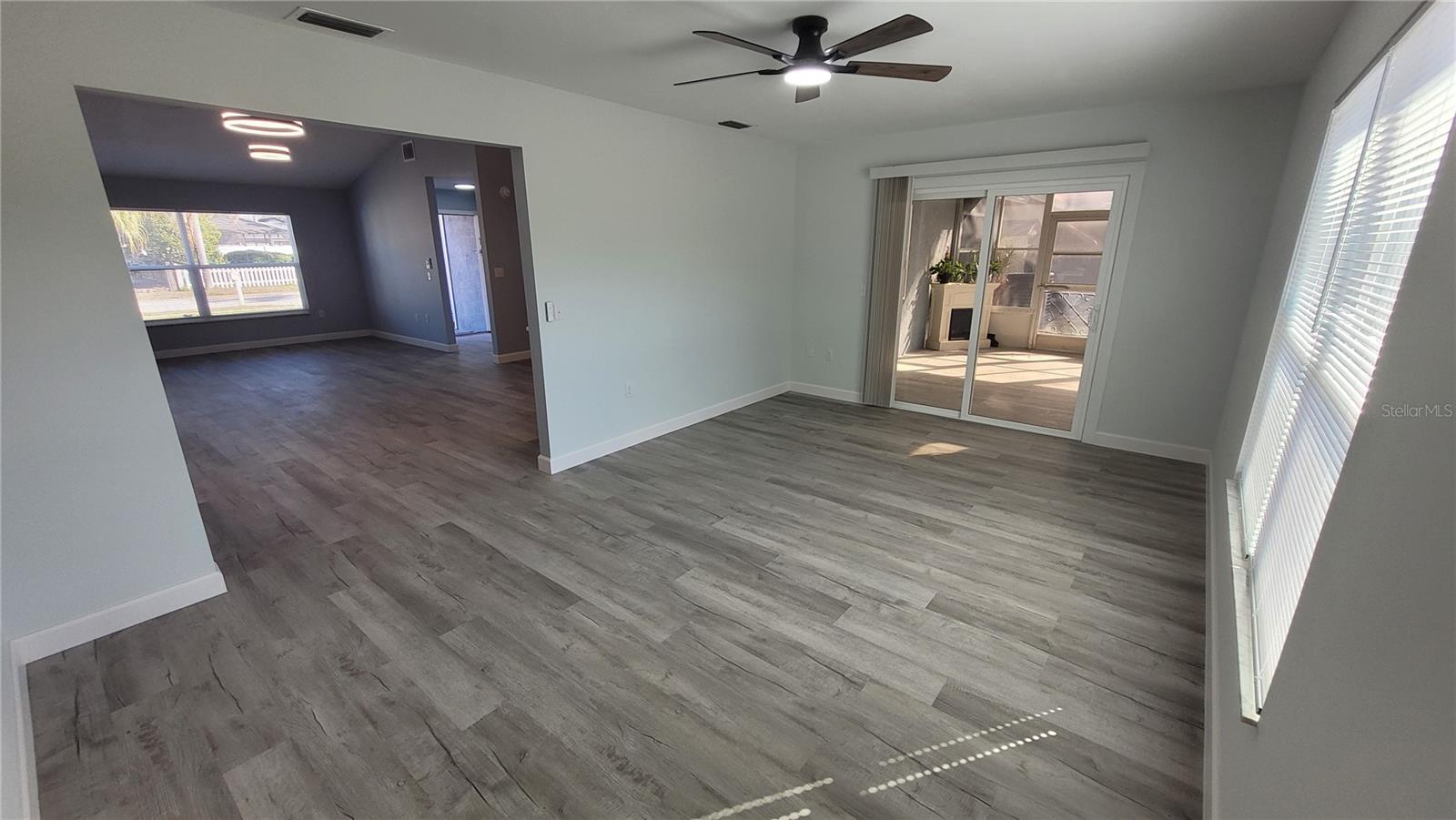 Family room , new sliding door to enclosed Florida room