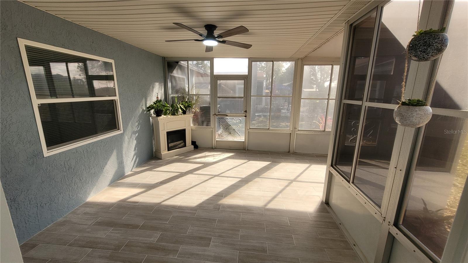 Florida room with fireplace