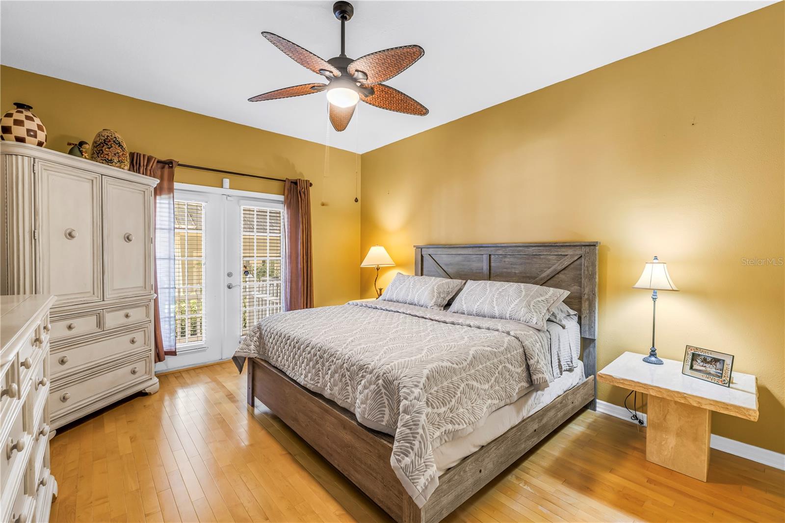 Spacious Master Suite with french doors out to the back.