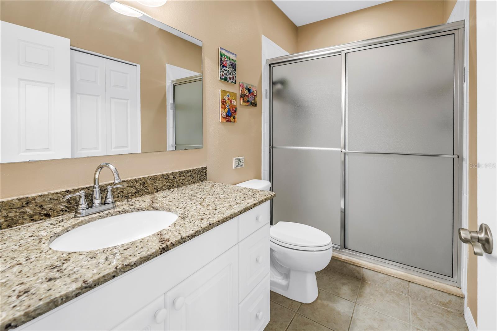 Second Floor Bathroom with additional washer/dryer hook-up in closet.