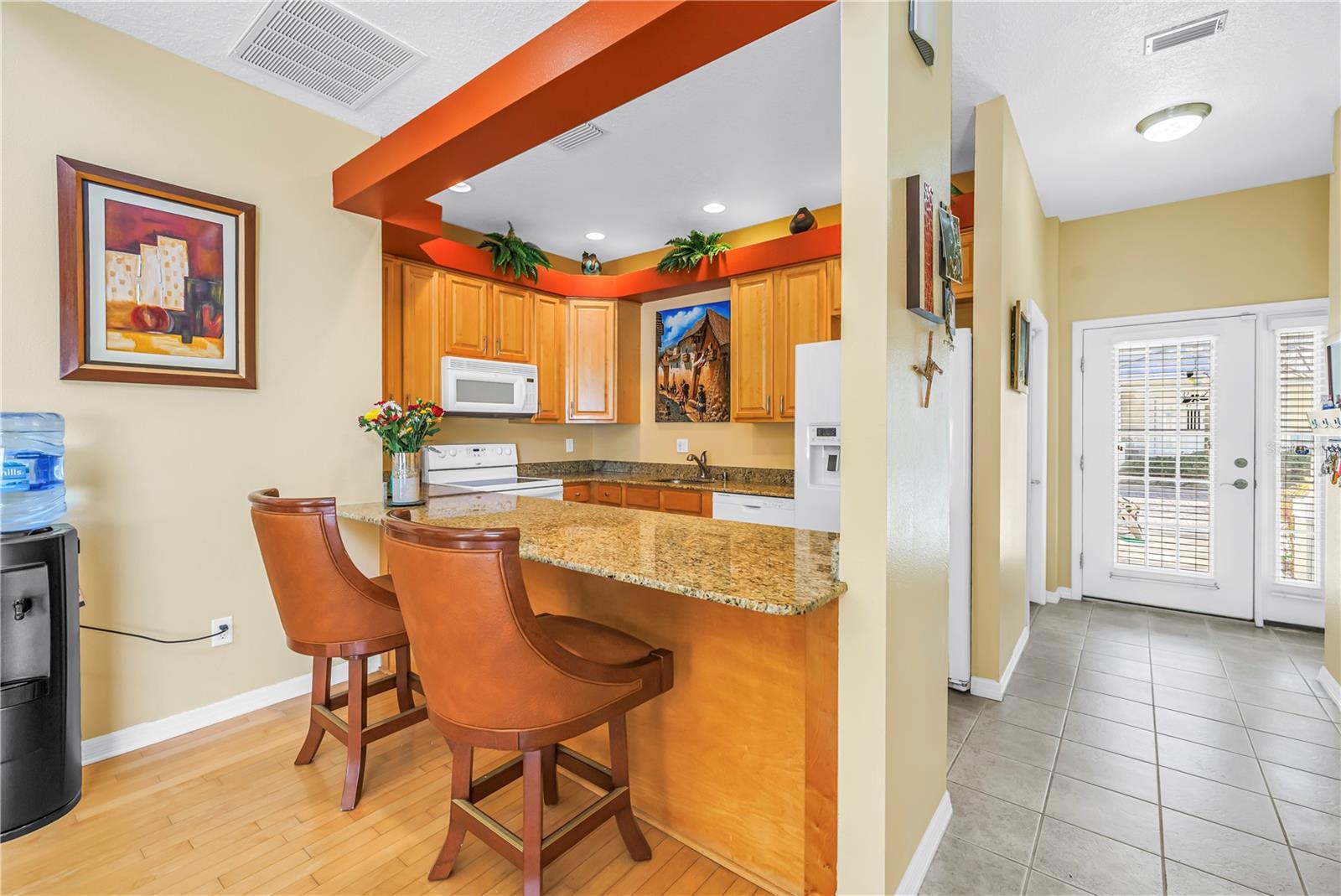 Looking back to kitchen and entry.